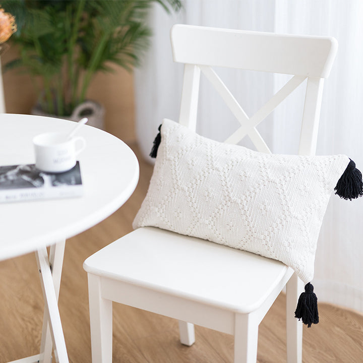 Square Boho cushion cover made of handwoven cotton with textured relief weaving and four tassels