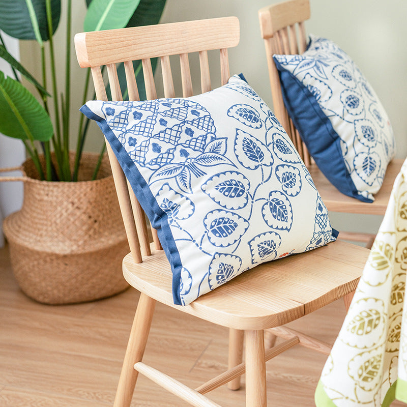 Square decorative cushion cover with botanical leaf print, cotton-linen mix and contrasting piped edge