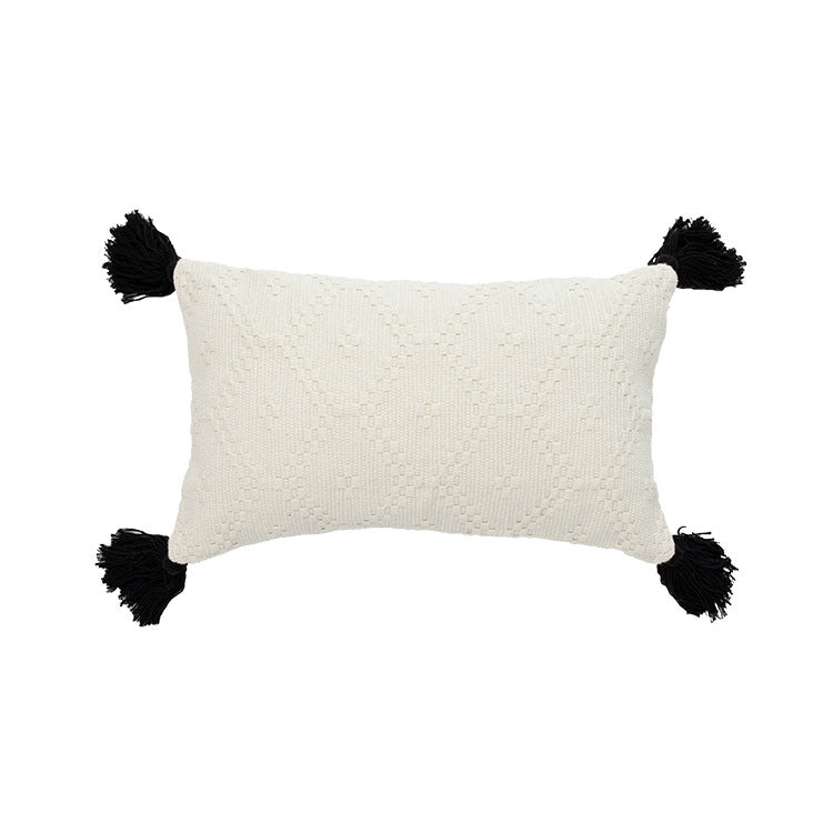 Square Boho cushion cover made of handwoven cotton with textured relief weaving and four tassels
