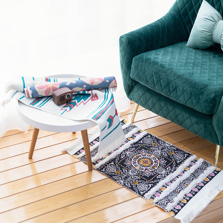 Flat-woven runner rug in ethnic stripe design with hand-fringed edge