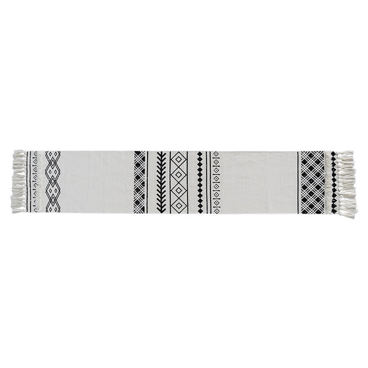 Boho table runner made of cotton blend with woven ethnic jacquard and decorative fringes