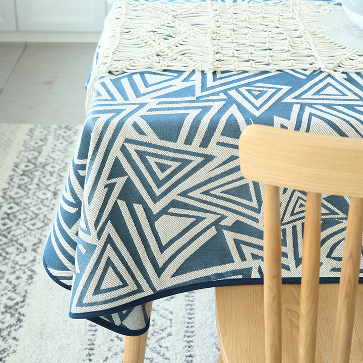 Woven jacquard tablecloth made of cotton blend with geometric triangle design