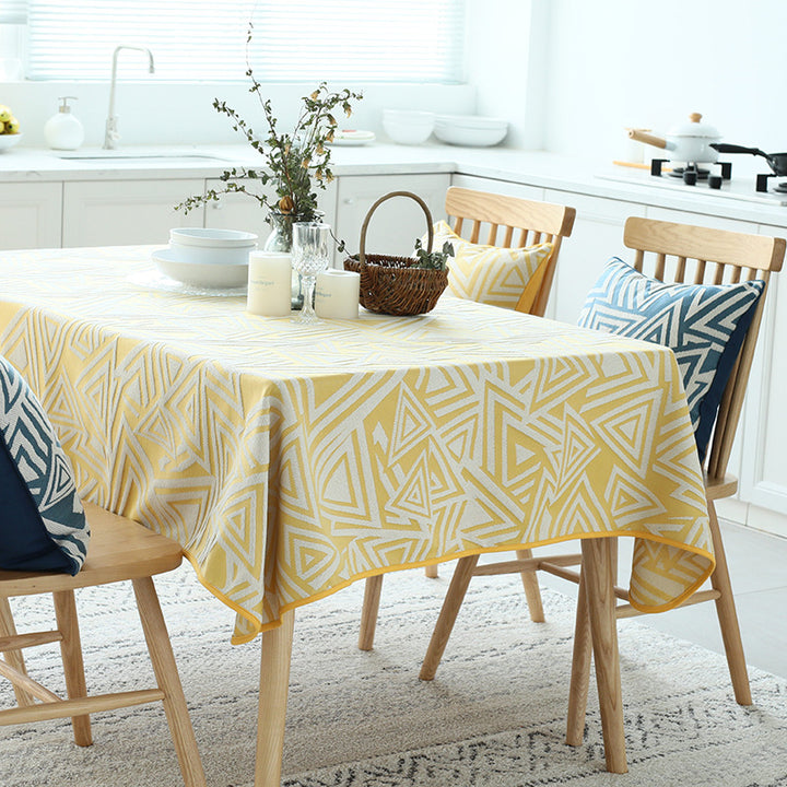 Woven jacquard tablecloth made of cotton blend with geometric triangle design