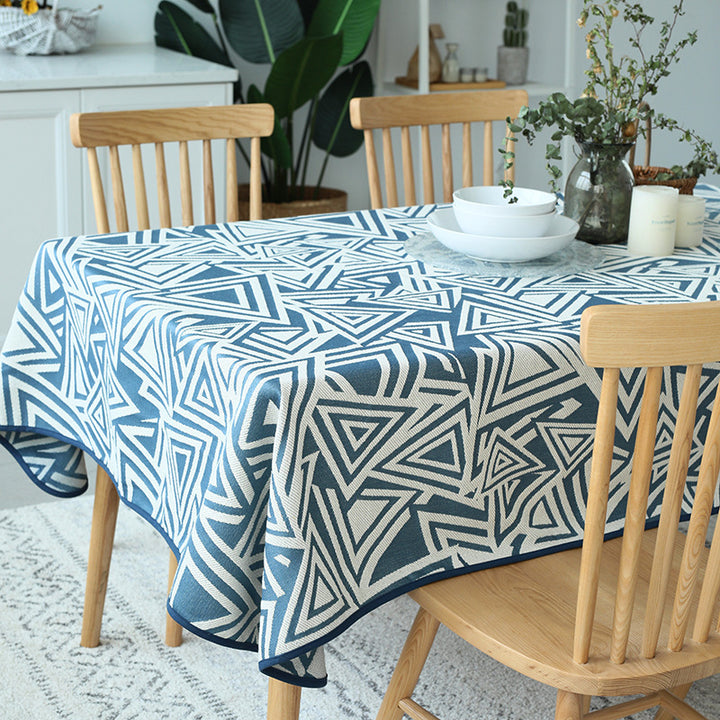 Woven jacquard tablecloth made of cotton blend with geometric triangle design