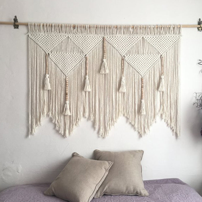 Elegant Macrame Wall Hanging with ornate fringes and leaves
