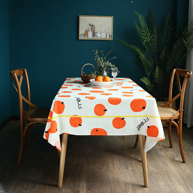 Rectangular cotton blend tablecloth with fruity orange print and easy-care finish