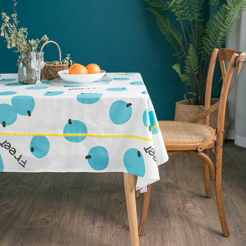Rectangular cotton blend tablecloth with fruity orange print and easy-care finish