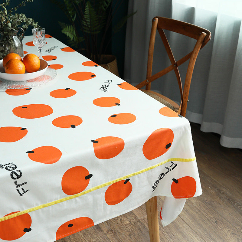 Rectangular cotton blend tablecloth with fruity orange print and easy-care finish