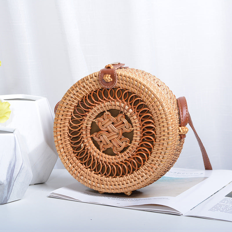 Elegant round handbag made of woven rattan