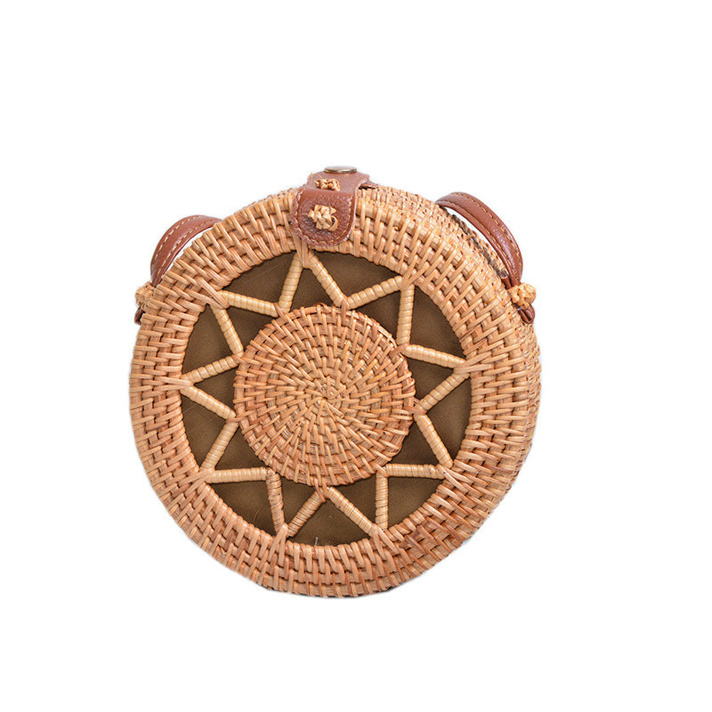 Elegant round handbag made of woven rattan