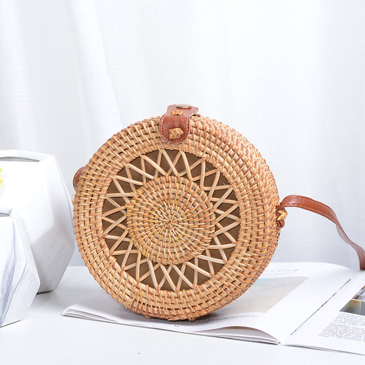 Elegant round handbag made of woven rattan