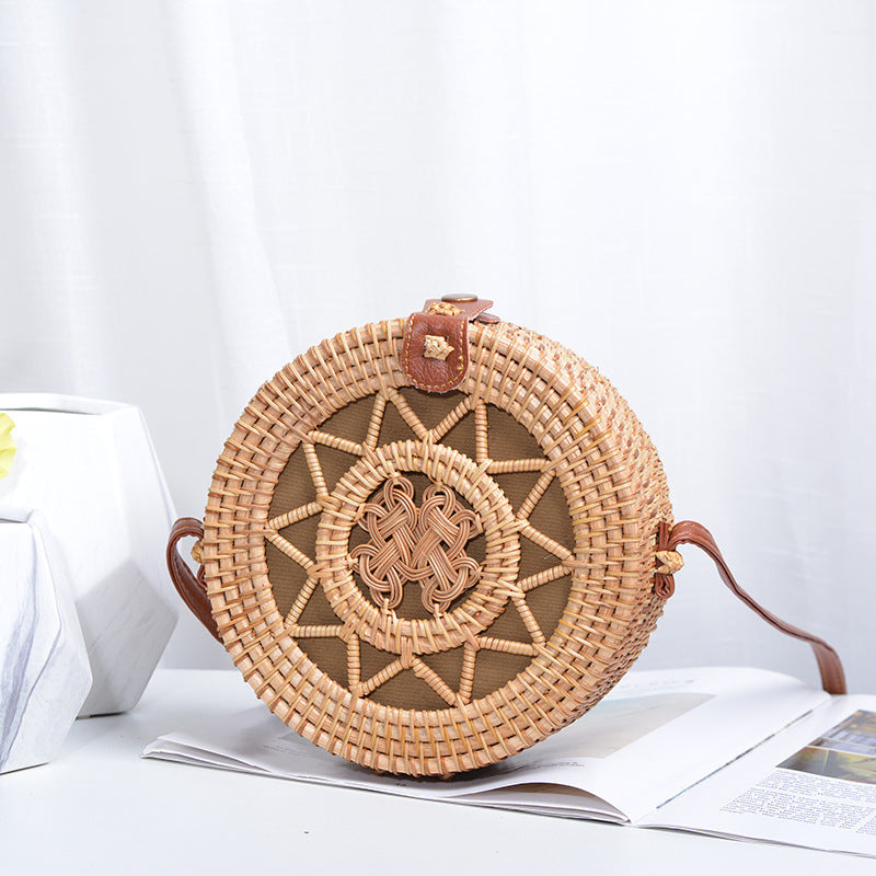 Elegant round handbag made of woven rattan
