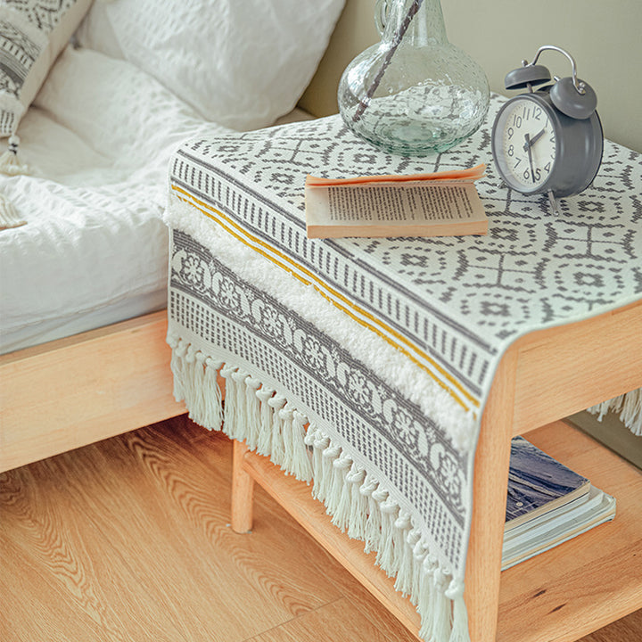 Handwoven cotton runner in Scandi-Boho style with fringes and geometric diamond jacquard