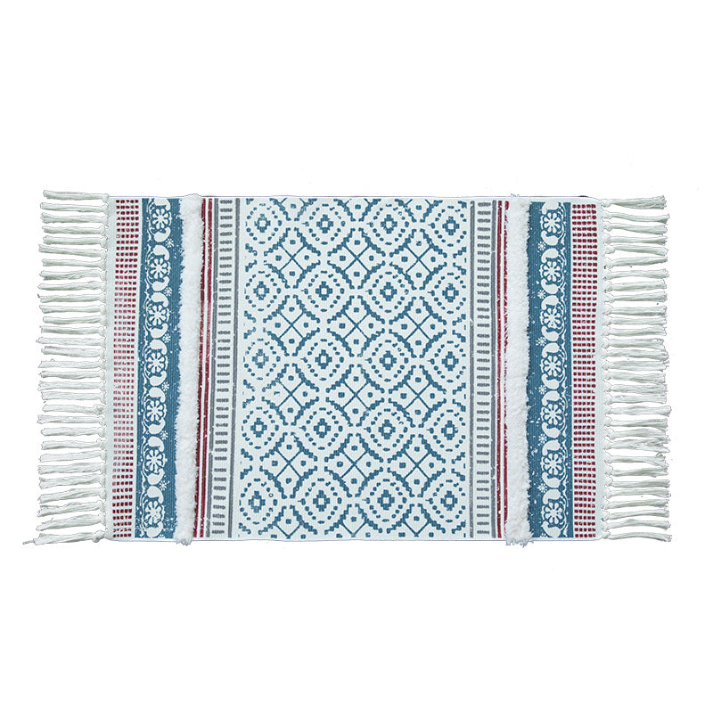 Handwoven cotton runner in Scandi-Boho style with fringes and geometric diamond jacquard