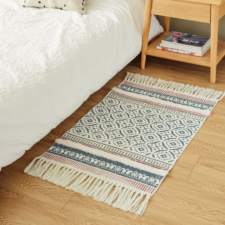 Handwoven cotton runner in Scandi-Boho style with fringes and geometric diamond jacquard