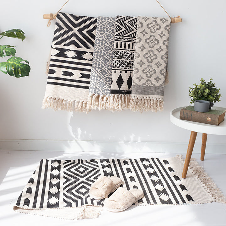 Flat-woven cotton runner with Mediterranean tile jacquard and decorative fringes