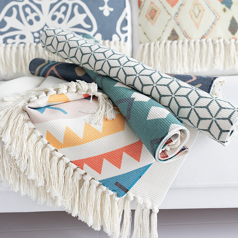 Flat-woven cotton carpet runner with ethnic diamond pattern and decorative fringes