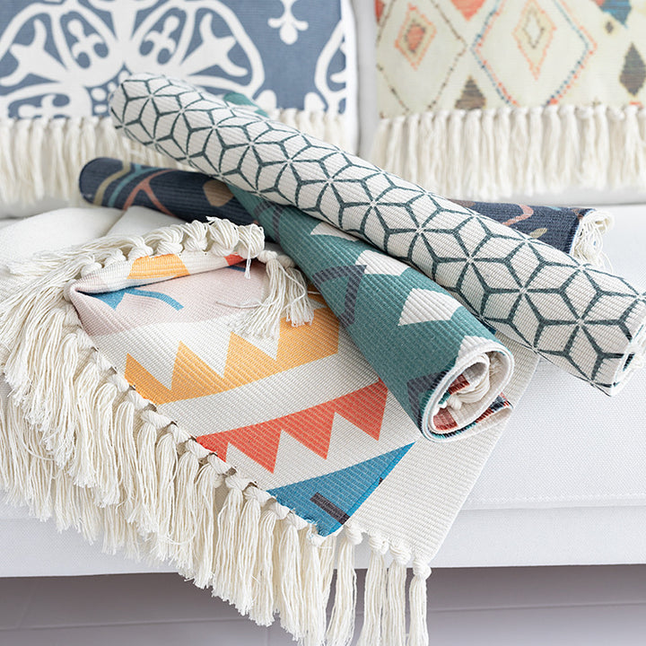 Flat-woven cotton carpet runner with ethnic diamond pattern and decorative fringes