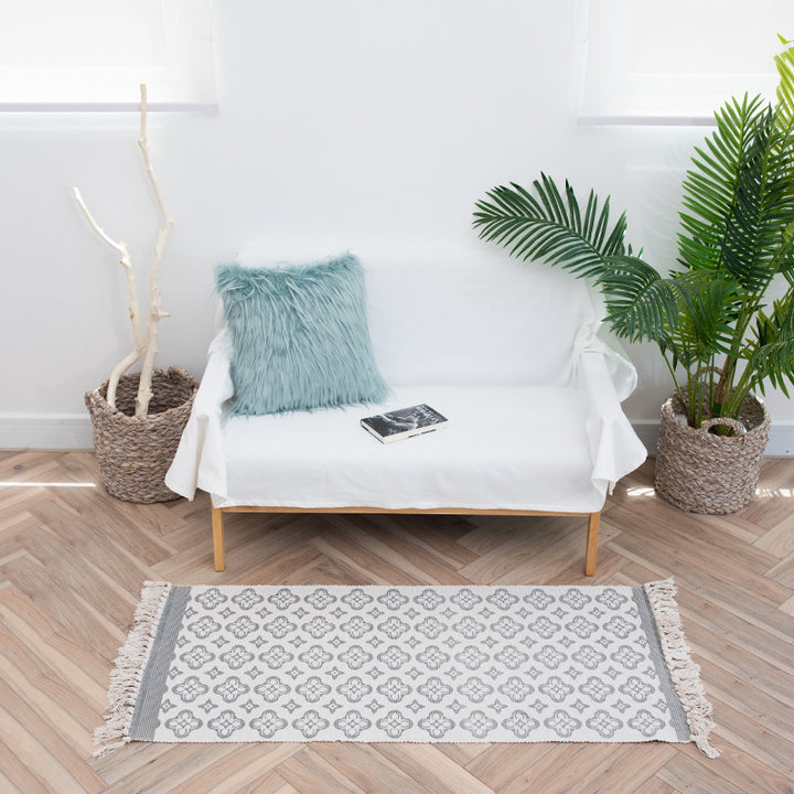 Flat-woven cotton runner with Mediterranean tile jacquard and decorative fringes