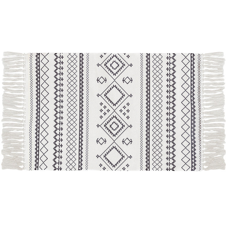 Flat-woven cotton carpet runner with ethnic diamond pattern and decorative fringes