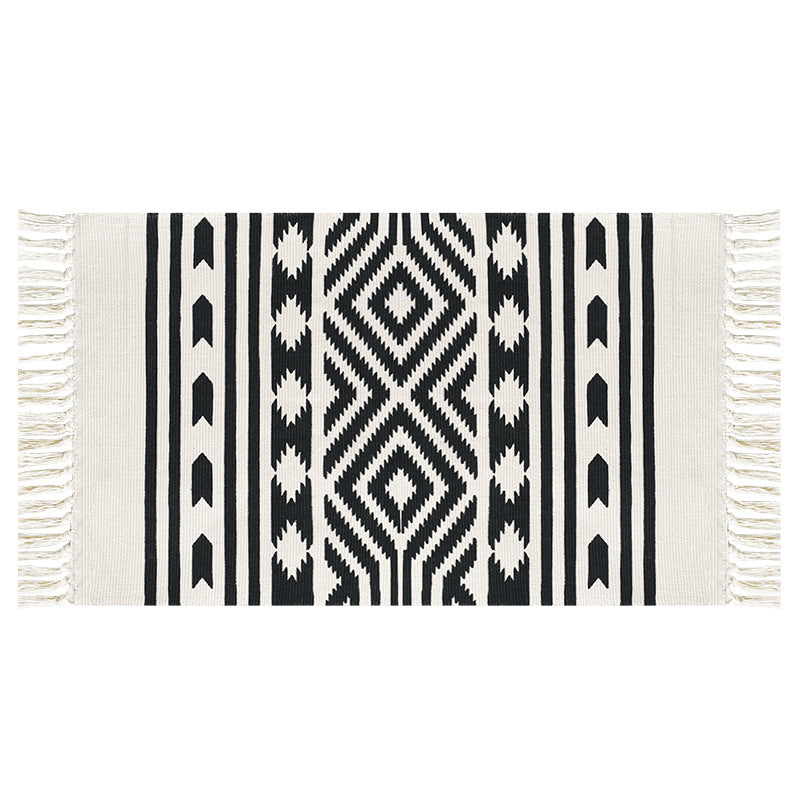 Flat-woven cotton runner with Mediterranean tile jacquard and decorative fringes