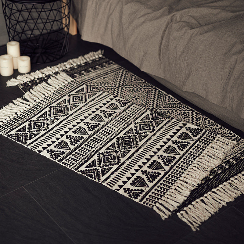 Flat-woven cotton blend runner with ethnic diamond jacquard and fringes
