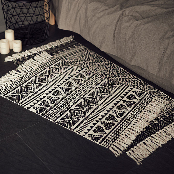Flat-woven cotton blend runner with ethnic diamond jacquard and fringes