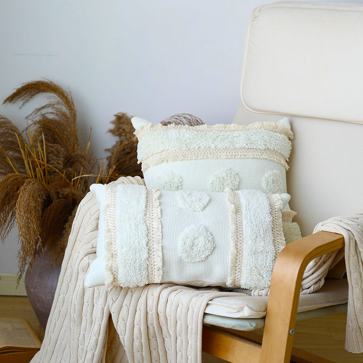 Decorative woven cushion cover with tufted circle applications and textured cotton surface