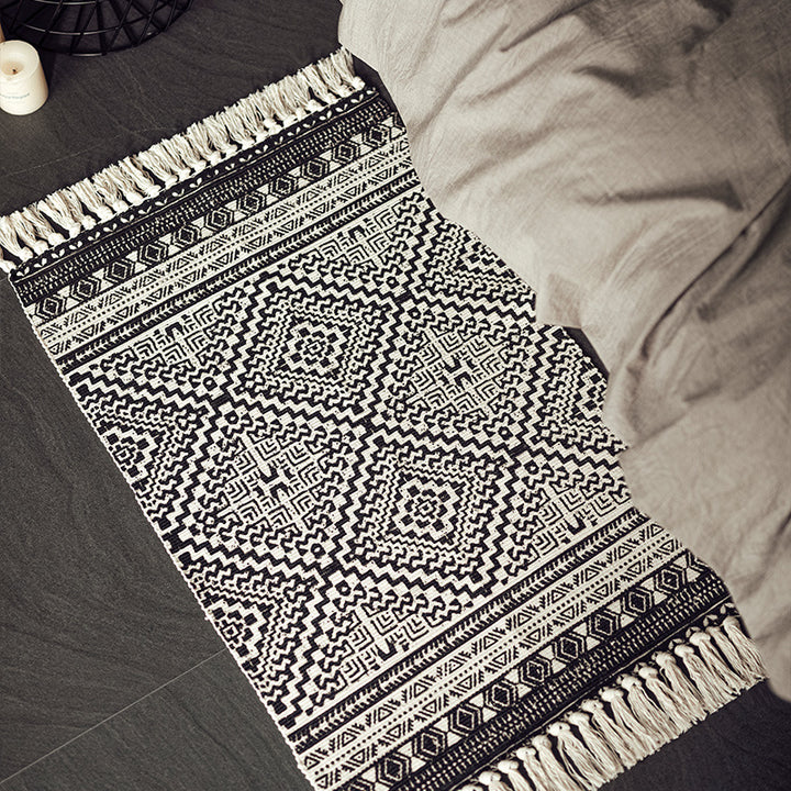 Flat-woven cotton blend runner with ethnic diamond jacquard and fringes