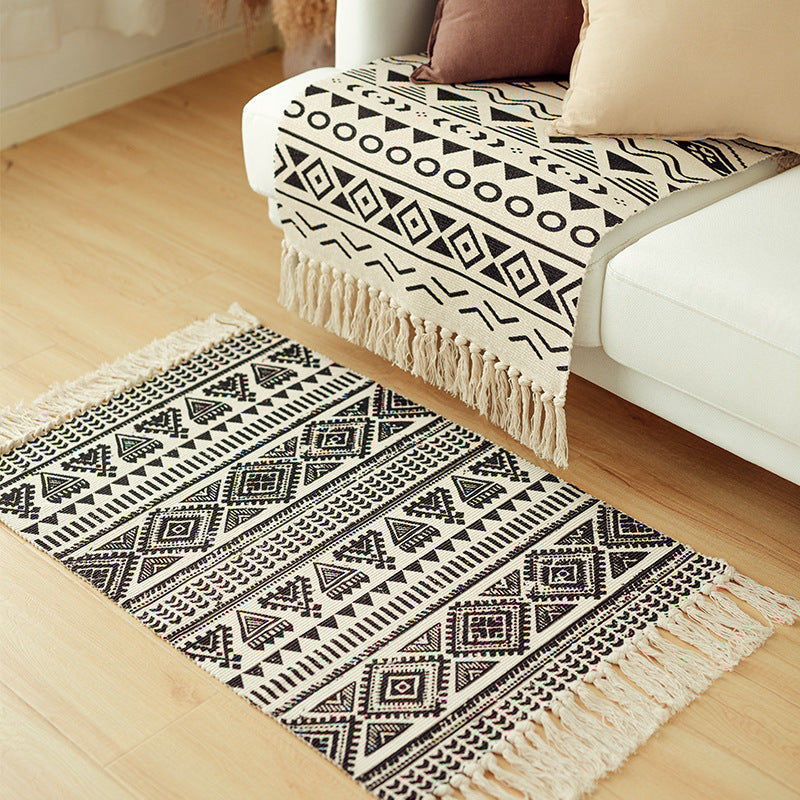 Flat-woven cotton blend runner with ethnic diamond jacquard and fringes