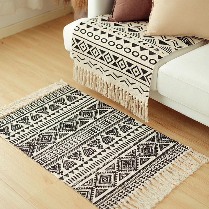 Flat-woven cotton blend runner with ethnic diamond jacquard and fringes