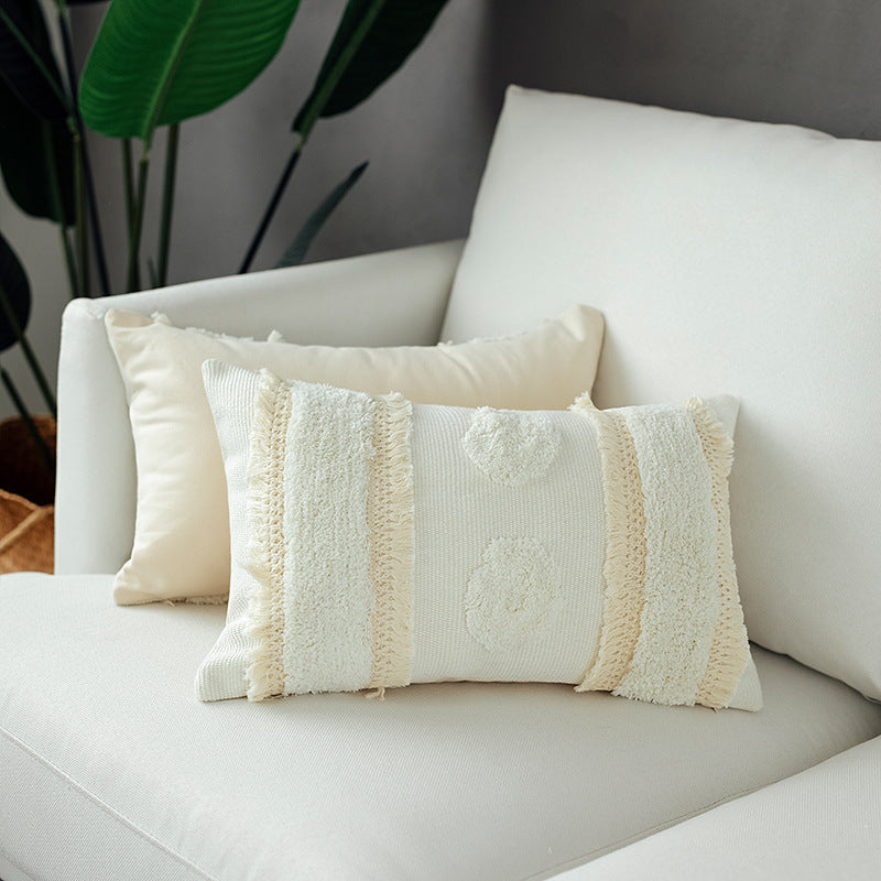 Decorative woven cushion cover with tufted circle applications and textured cotton surface