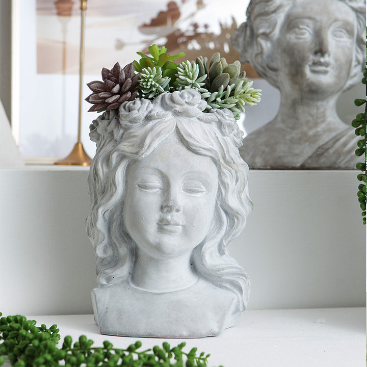 Artistic head sculpture flower pot