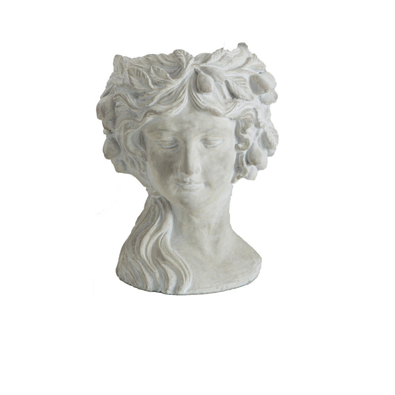 Artistic head sculpture flower pot