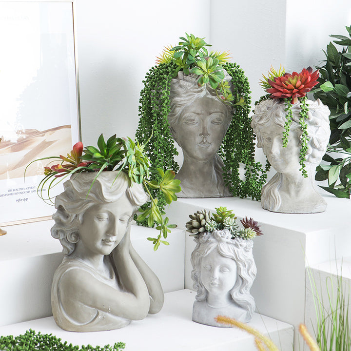 Artistic head sculpture flower pot