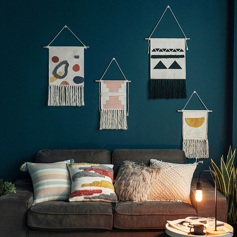 Hand-woven wall hanging and table runner made of cotton blend with geometric staircase pattern and long fringes