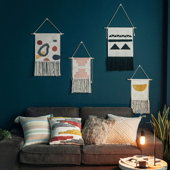 Hand-woven wall hanging and table runner made of cotton blend with geometric staircase pattern and long fringes