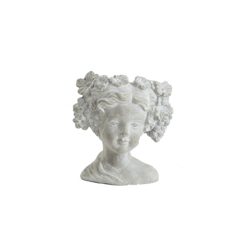 Artistic head sculpture flower pot