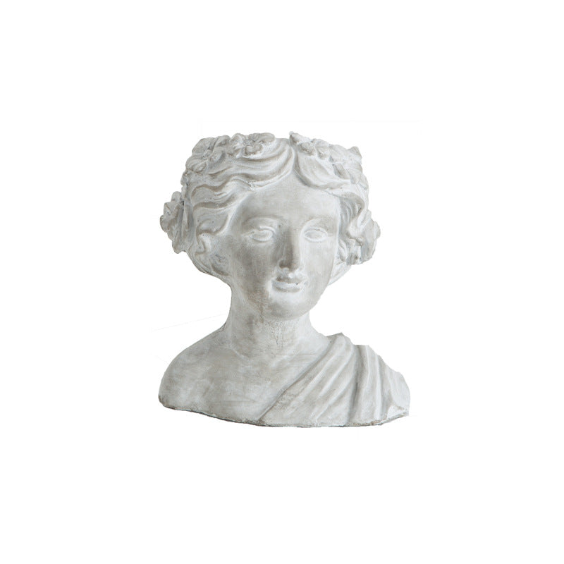 Artistic head sculpture flower pot