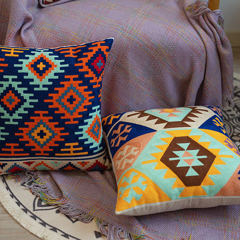 Woven decorative cushion cover with hand-tufted ethnic zigzag pattern