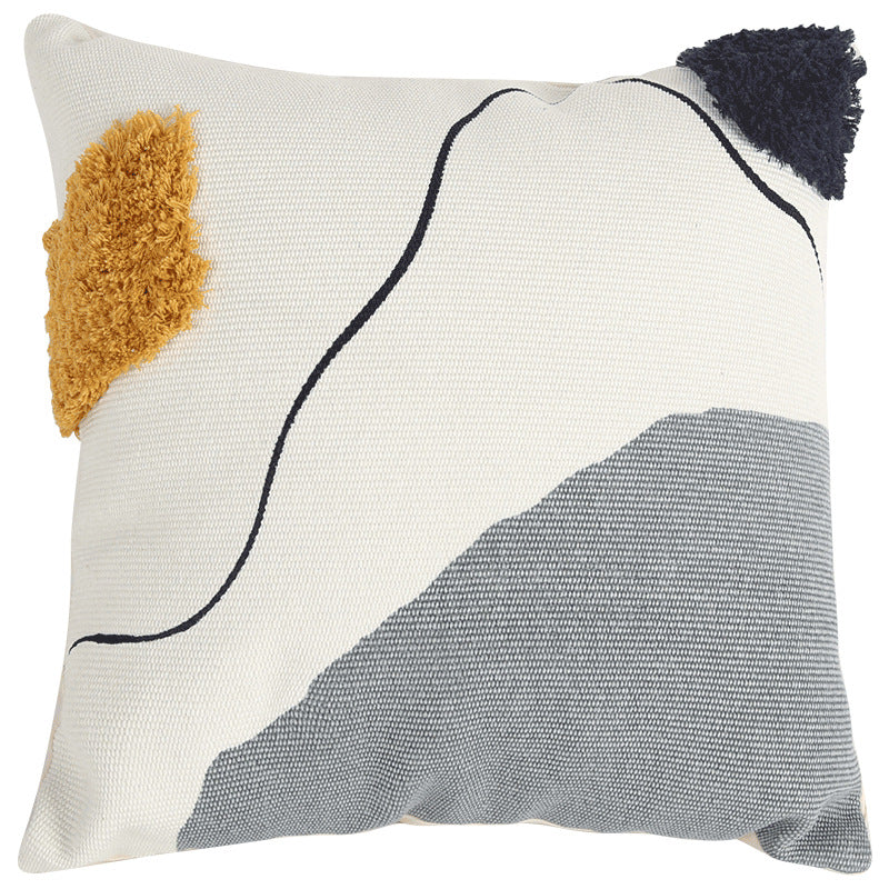 Woven decorative cushion cover in an abstract-minimalist Scandi look with hand-tufted applications