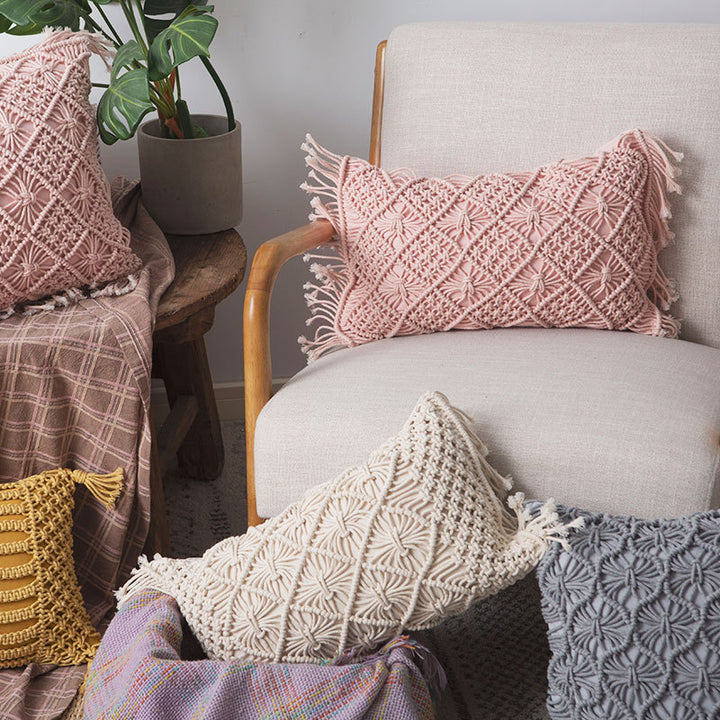 Rectangular cushion cover in macramé style with tufted floral appliqués and fringes