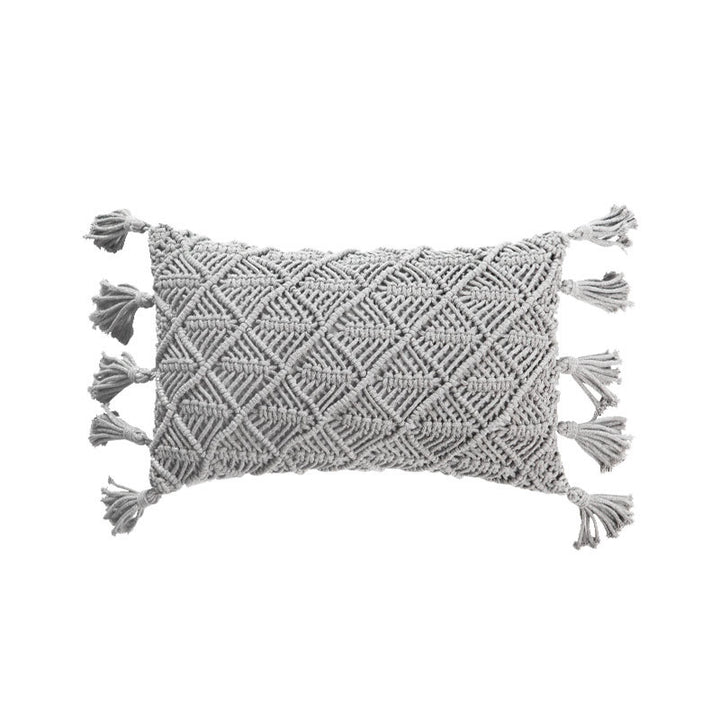 Rectangular cushion cover in macramé style with tufted floral appliqués and fringes
