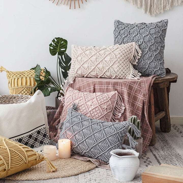 Rectangular cushion cover in macramé style with tufted floral appliqués and fringes