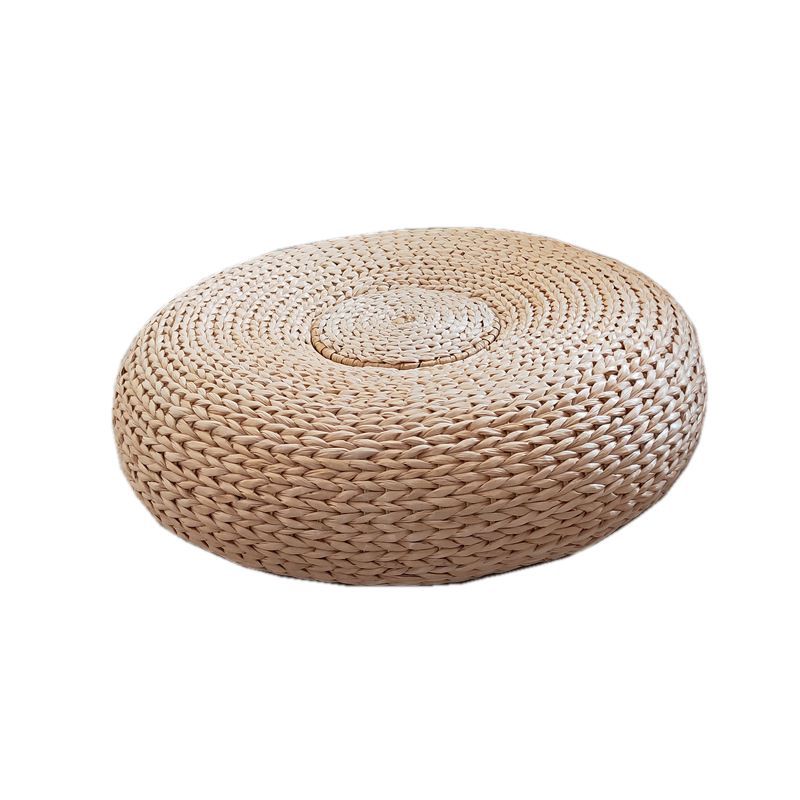 Handcrafted sitting pouf made of natural material