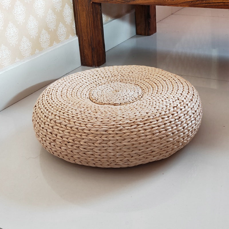 Handcrafted sitting pouf made of natural material