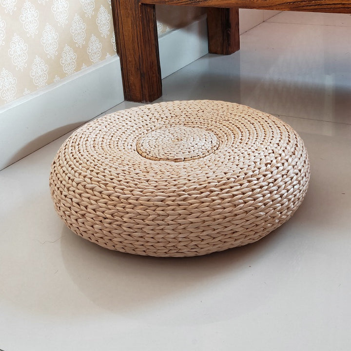 Handcrafted sitting pouf made of natural material