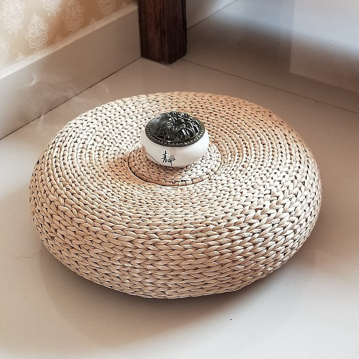 Handcrafted sitting pouf made of natural material
