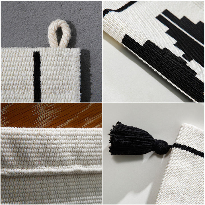 Woven wall hanging with graphic ethnic relief and tassels