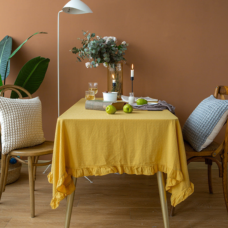 Rectangular tablecloth made of cotton waffle fabric with fine ruffle trim